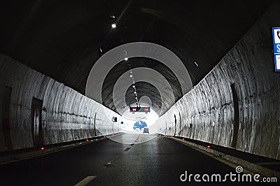 large lighted tunnel and road Stock Photo