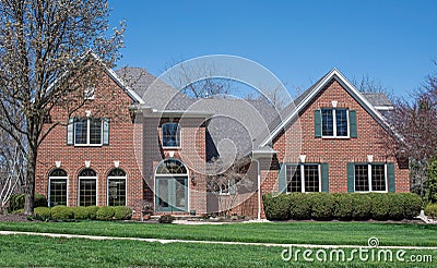 Large Luxurious House with Arched Windows and Entrance Stock Photo