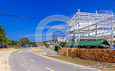 Large metal construction by a road Editorial Stock Photo