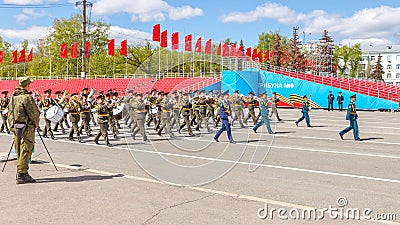 a large military band at the rehearsal of the Victory Day parade on Kuybyshev Square Editorial Stock Photo