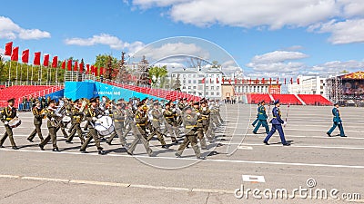 a large military band at the rehearsal of the Victory Day parade on Kuybyshev Square Editorial Stock Photo