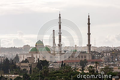Mosque with minarets and green domes in centre of Aleppo Syria before the war Stock Photo