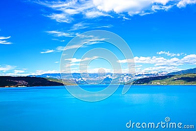 A large mountain lake and mountains. Stock Photo