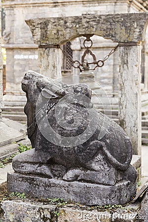 Large Nandi sacred Shiva mount bull stone sculpture, Nepal Stock Photo