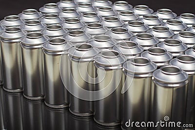 A large number of aerosol cans on a black background Stock Photo
