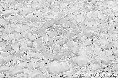 Large number of white broken plates as a background or backdrop Stock Photo