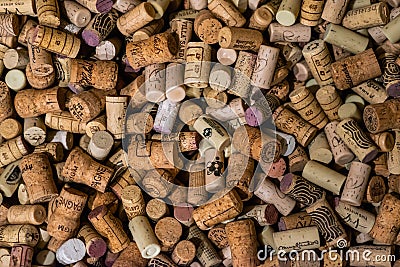 A large number of wine bars, background for winery, cork stoppers Editorial Stock Photo