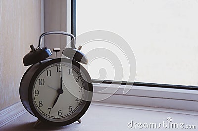 Large old vintage alarm clock Stock Photo