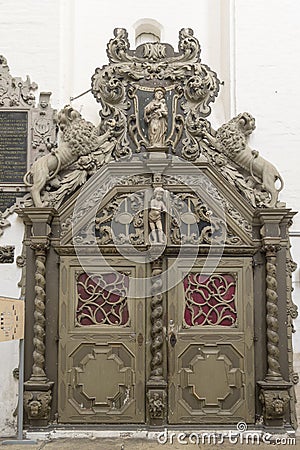 Large ornate door inside St Mary`s Church Rostock Germany Stock Photo
