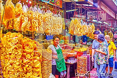 The large packs of fried rice snacks, Sampheng market in Bangkok`s Chinatown, Thailand Editorial Stock Photo