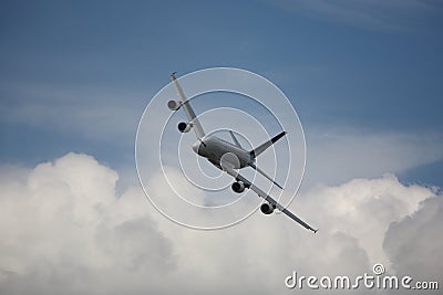 Large passenger jet banking Stock Photo