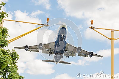 Large passenger jet landing Stock Photo