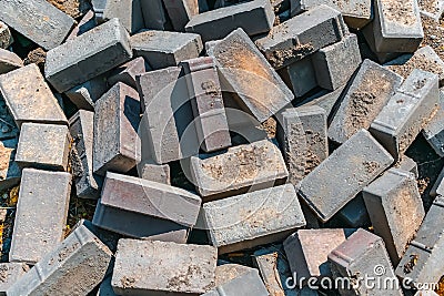 Pile of building blocks piled together at a construction site Stock Photo