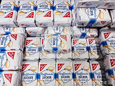 Large pile of house brand Gut & Gunstig sugar in a supermarket for sale Editorial Stock Photo