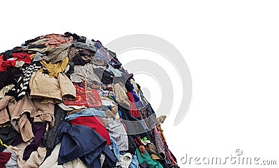 large pile stack of textile fabric clothes and shoes. concept of recycling, up cycling, awareness to global climate change Stock Photo