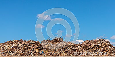 Large pile of wood on a garbage depot Stock Photo