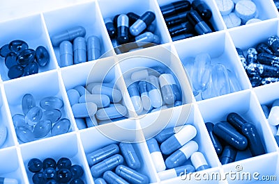 Large pill box for individual weekly pill storage. Stock Photo