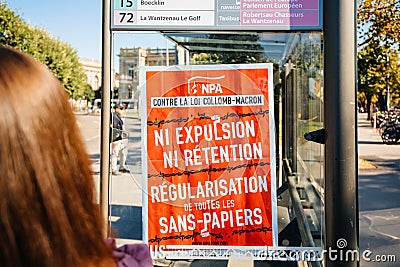 Large placard at the bus staation during protest Editorial Stock Photo