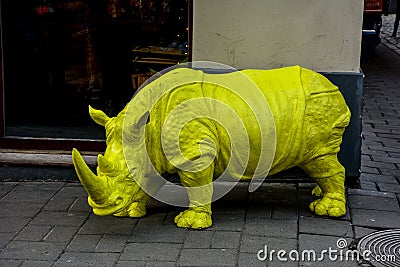 A large plastic rhino figure, a symbol of confidence and fearlessness Stock Photo