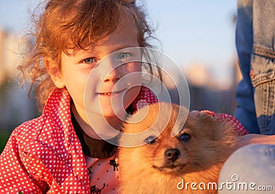 Large portrait of adorable little girl with doggie Stock Photo