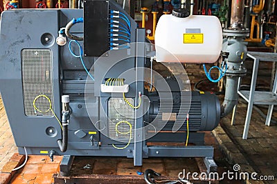 Large powerful industrial gas air centrifugal compressor for pumping gases and creating pressure with an asynchronous electric Stock Photo