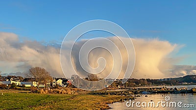 Large rainy clouds come in from the south in the summer Stock Photo