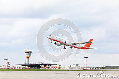 Large passenger airplane takes off at airport. Stock Photo