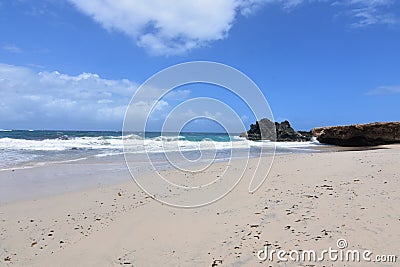 Large Rock Formations on the Edge of Andicuri Beach Stock Photo