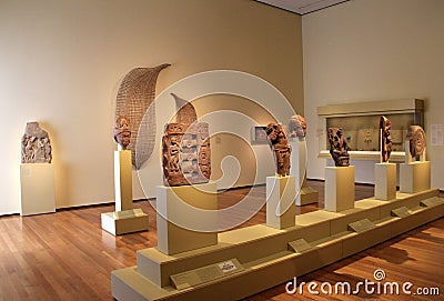 Large room with Egyptian artifacts set on pedestals, Cleveland Art Museum, Ohio, 2016 Editorial Stock Photo