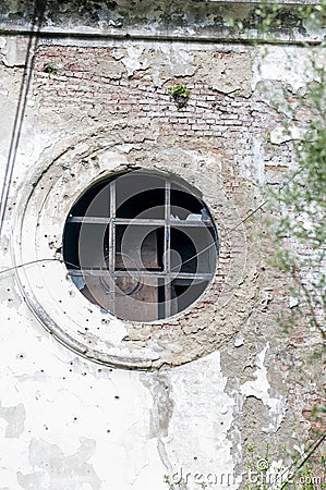 Large round window in an old abandoned building Editorial Stock Photo