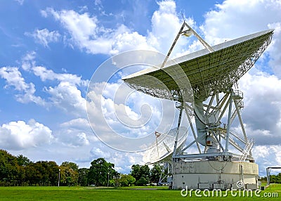 Large satellite dish with cloudy sky for telecommunications and broadcasting in Thailand Stock Photo