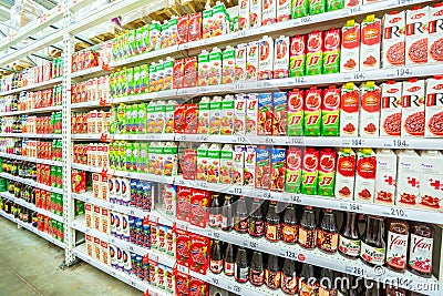 A large selection of fruit juices in the supermarket. Editorial Stock Photo