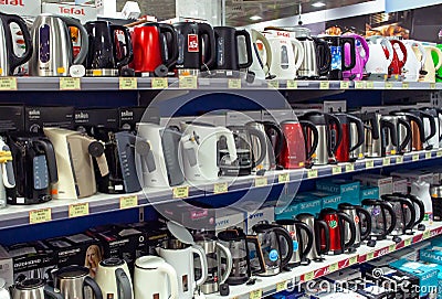 Large selection of teapots on store shelves. Editorial Stock Photo