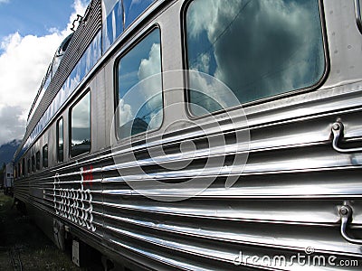 A large silver passenger train Stock Photo