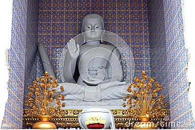 A Large Sitting Buddhist Monk Statue Stock Photo