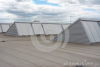 Large skylights and hydro insulation membranes on modern industrial hall Stock Photo