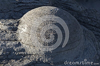 Large spherical nodule of sandstone. Stock Photo