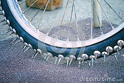 Large spikes on the wheels of bike for Speedway Stock Photo