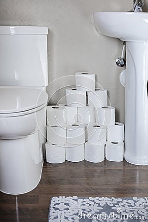 Large stack of toilet paper rolls in a bathroom. Ready for an emergency Stock Photo