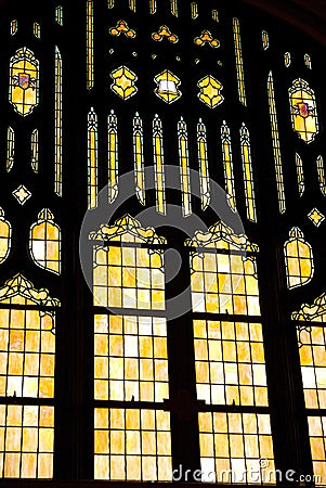 A large stained glass window inside a church Stock Photo