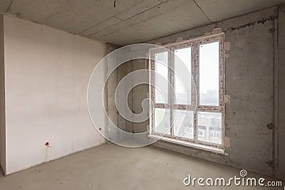 Large stained glass window and plastered wall in a new building Stock Photo