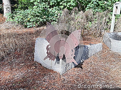 Large Standing Metal Butterfly the park. Stock Photo