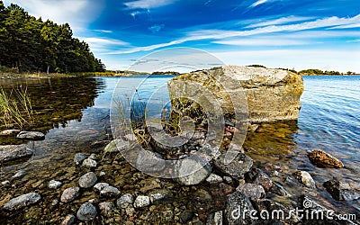 Large stone on a beach Stock Photo