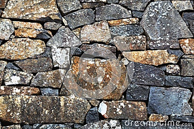 Stone wall with different sized stones Stock Photo