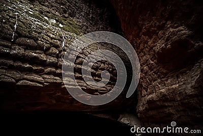 Large stones that resemble snake scales. This is Naka Cave, Bueng Kan Province. Stock Photo