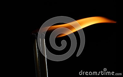 Large striking matches lighter with its flame showing Stock Photo