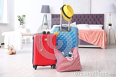 Large suitcases and bag packed for summer journey Stock Photo