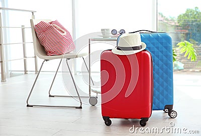 Large suitcases packed for summer journey Stock Photo