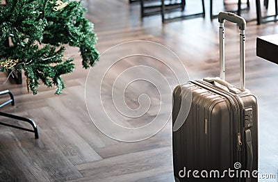 Large suitcases stand in the lobby of the hotel on the background Stock Photo