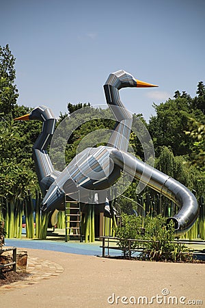 Large swan playground slide at The Gathering Place, Tulsa, OK Editorial Stock Photo
